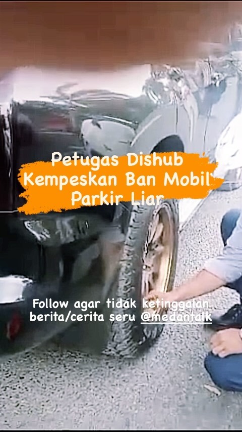 Petugas Dishub Medan Kempeskan ban mobil parkir liar dengan cara lepaskan angin